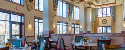 Bright and spacious dining room with large windows