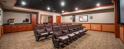 Interior view of a movie theater room with seats