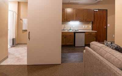 Interior view of a resident suite with kitchen area