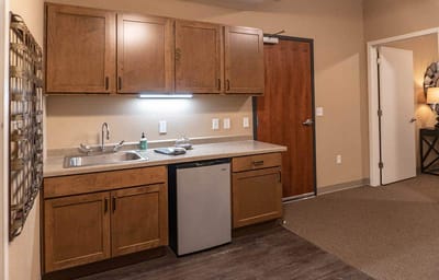 A view of a kitchenette in a resident room