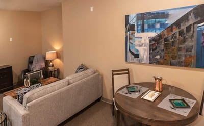 Cozy interior of a resident room with seating and decor