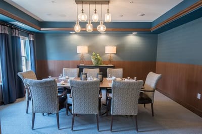 Elegant dining room setup ready for residents