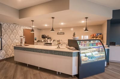 Interior dining area with a display case for food