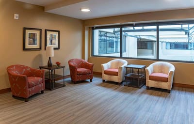 Cozy common area with chairs and tables
