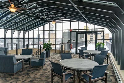 Bright common area with tables and chairs