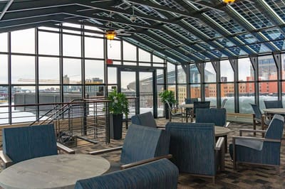 Bright indoor common area with modern furniture