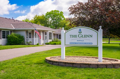 Exterior view of The Glenn facility with signage