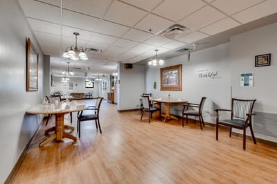 Dining area with tables and chairs set up