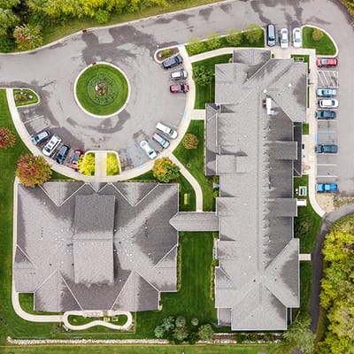 Aerial view of The Legacy of Delano campus and parking lot