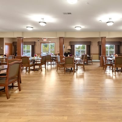 Dining room with wooden tables and chairs