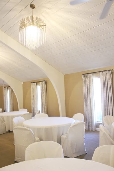 Interior view of a common area with tables and chairs
