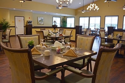 Dining area with tables set for a meal