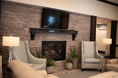 Cozy common area with fireplace and comfortable seating