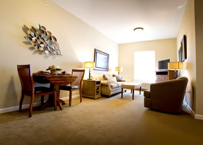 Inviting living room area with sofa and dining table