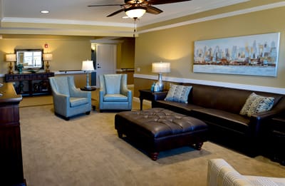 Cozy common area with seating and decorative art