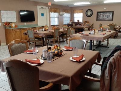 Dining area with tables set for a meal
