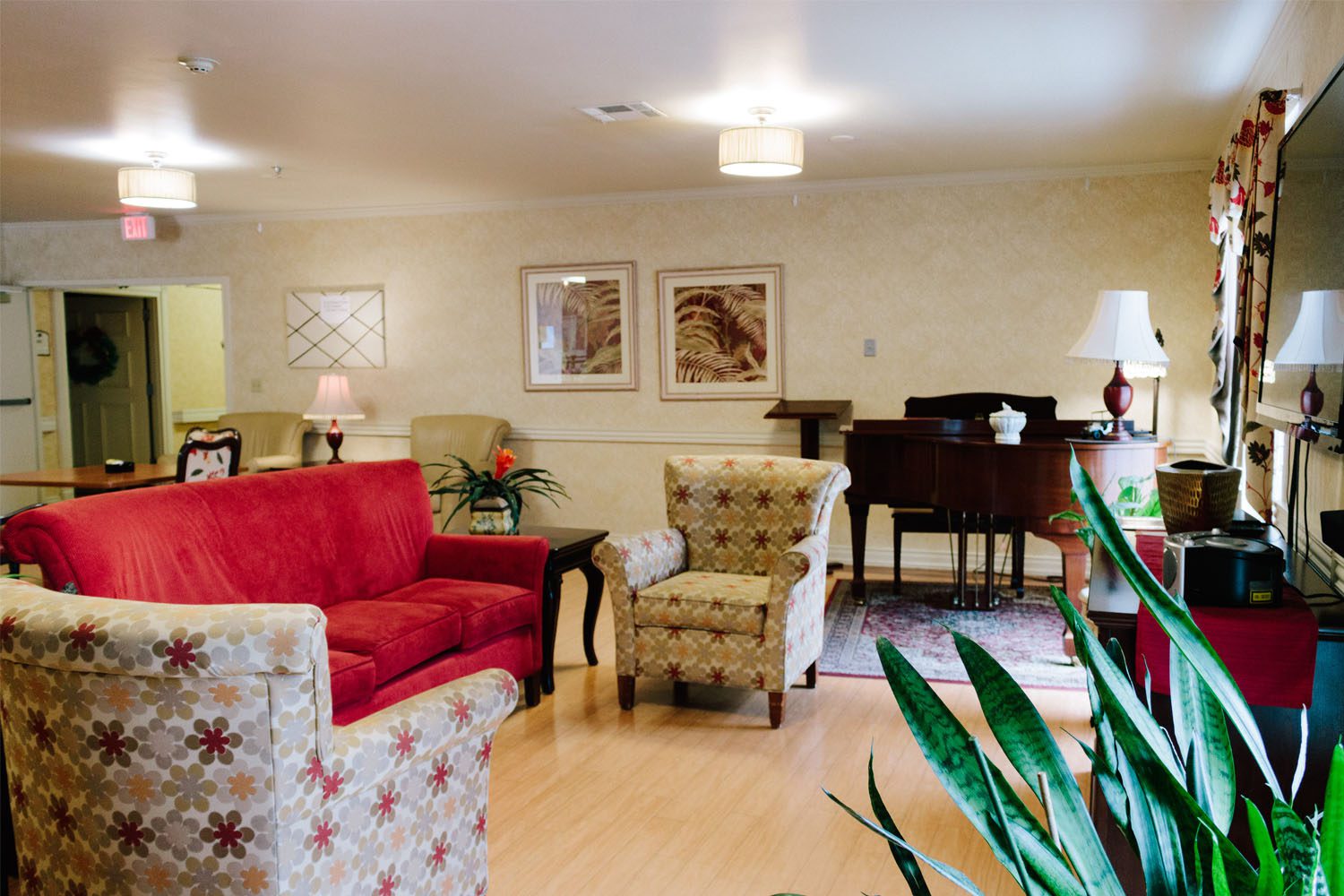 Cozy common area with seating and a piano