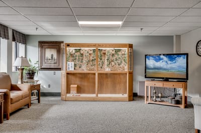 Interior common area with seating and an aquarium