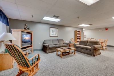 Common area with seating and a television.