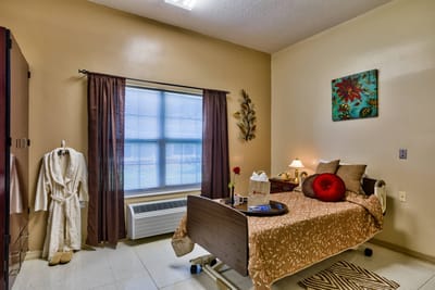 Comfortable room with bed and decorations