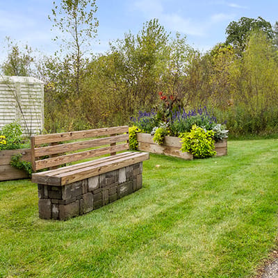 Outdoor seating area with landscaped garden