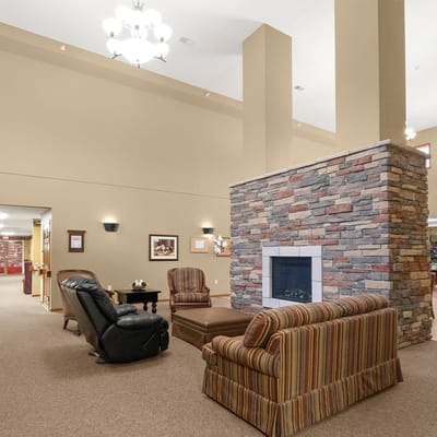 Interior view of a cozy common area with seating