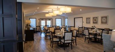 Dining area with tables set for a meal
