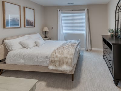 Bright, cozy resident bedroom with modern decor