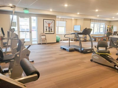 Interior view of a fitness area with exercise equipment