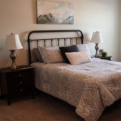 Cozy resident room with a neatly made bed