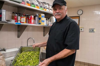 Chef preparing fresh vegetables in the kitchen