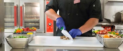 Chef preparing fresh ingredients in the kitchen