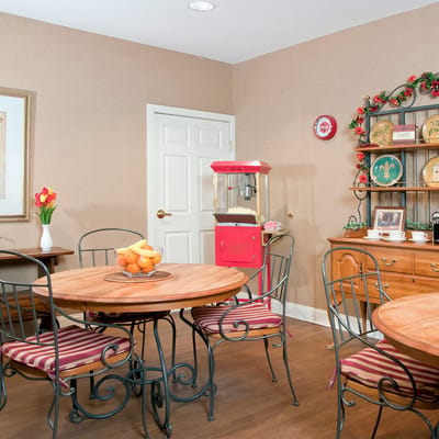 Bright dining room with tables and popcorn machine