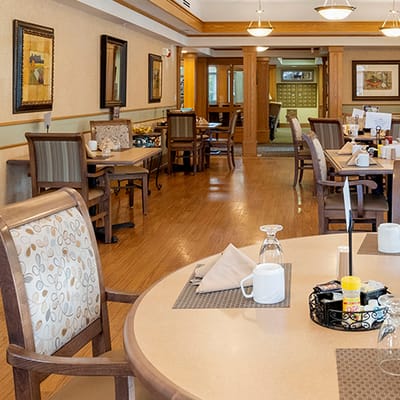 Dining area with tables set for meals