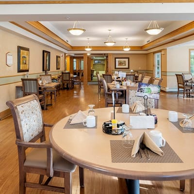 Dining room set for residents with tables and chairs