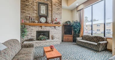 Comfortable lounge area with sofas and a fireplace