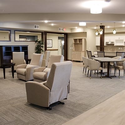 Common area with comfortable seating and kitchen