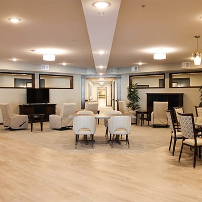 Interior common area with seating and a television