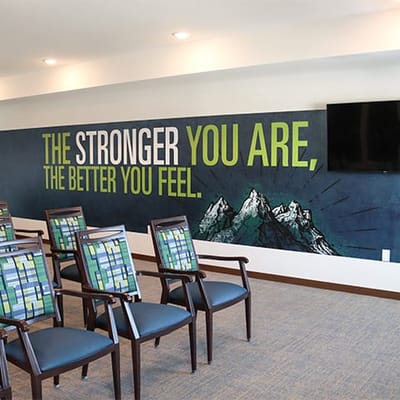 Interior space with motivational wall art and seating