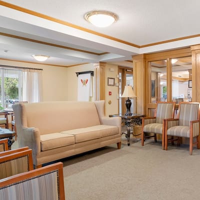 Interior view of a cozy common area with seating