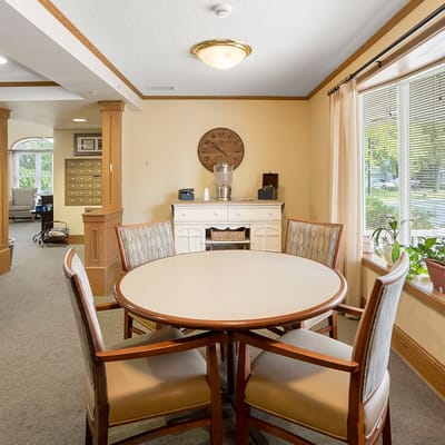 Cozy common area with a round table and chairs
