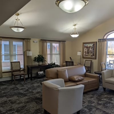Cozy common area with seating and natural light