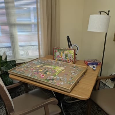Puzzle on a table in a cozy common area
