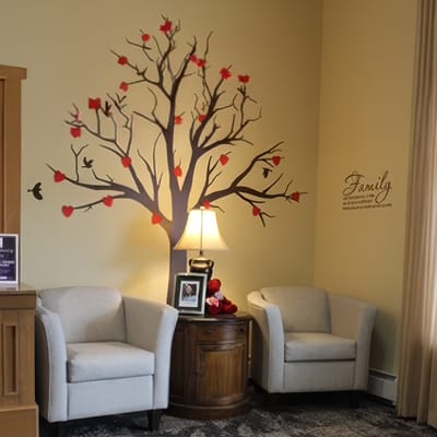 Interior decor with a tree mural in a common area