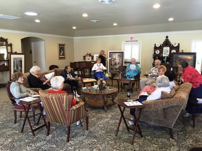 Residents enjoying a social gathering in a common area.