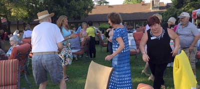 Residents enjoying a lively outdoor gathering