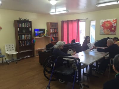 Residents engaging in an activity in a common area