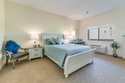 Cozy bedroom with light-colored furnishings