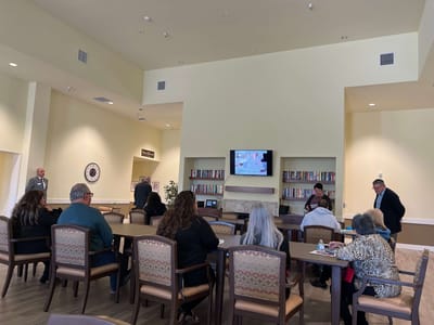 Residents and staff gathering in a common area.