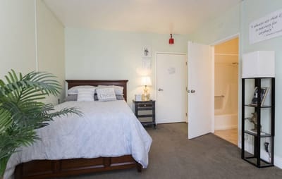 Cozy private resident bedroom with calming decor.